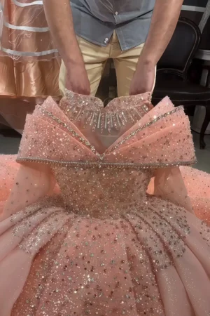 luxury peach glitter wedding dress off shoulder ball gown bodice detail